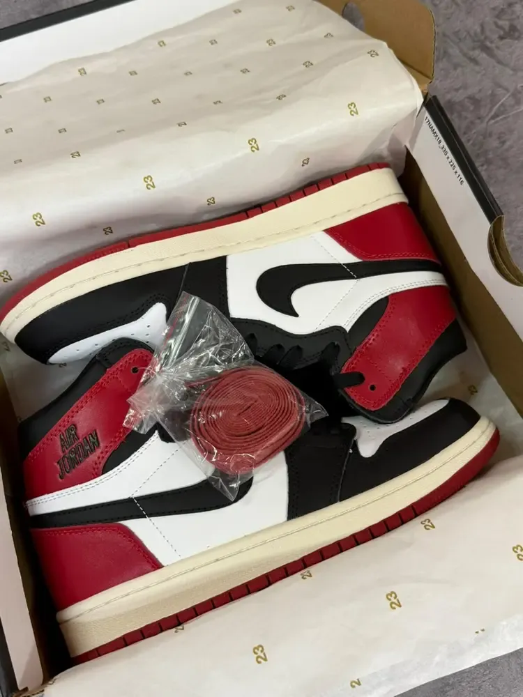 Jordan Retro 1 High OG "Black Toe Reimagined"